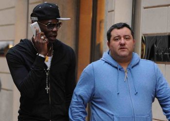 MILAN, ITALY - MARCH 05:  Mino Raiola (R) and Mario Balotelli are seen on March 5, 2013 in Milan, Italy.  (Photo by Jacopo Raule/Getty Images)