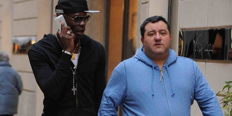 MILAN, ITALY - MARCH 05:  Mino Raiola (R) and Mario Balotelli are seen on March 5, 2013 in Milan, Italy.  (Photo by Jacopo Raule/Getty Images)