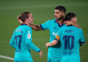 Antoine Griezmann of Barcelona celebrates with Lionel Messi and Luis Suarez after scoring his sides second goal during the Liga match between Villarreal CF and FC Barcelona at Estadio de la Ceramica on July 5, 2020 in Villareal, Spain. (Photo by Jose Breton/Pics Action/NurPhoto via Getty Images)