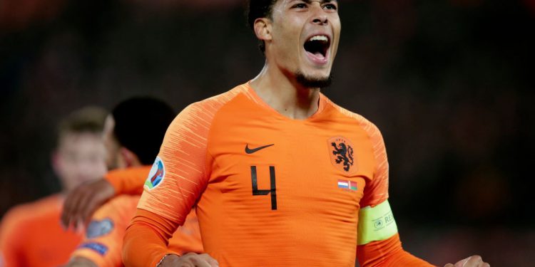 ROTTERDAM, NETHERLANDS - MARCH 21: Virgil van Dijk of Holland celebrates 4-0 during the  EURO Qualifier match between Holland  v Belarus  at the Feyenoord Stadium on March 21, 2019 in Rotterdam Netherlands (Photo by Peter Lous/Soccrates/Getty Images)