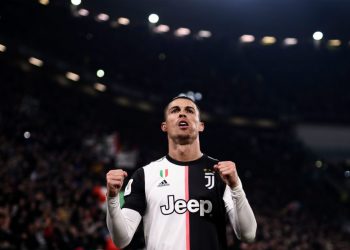 Juventus' Portuguese forward Cristiano Ronaldo celebrates after opening the scoring during the Italian Cup (Coppa Italia) round of 8 football match Juventus vs AS Roma on January 22, 2020 at the Juventus stadium in Turin. (Photo by Marco BERTORELLO / AFP) (Photo by MARCO BERTORELLO/AFP via Getty Images)