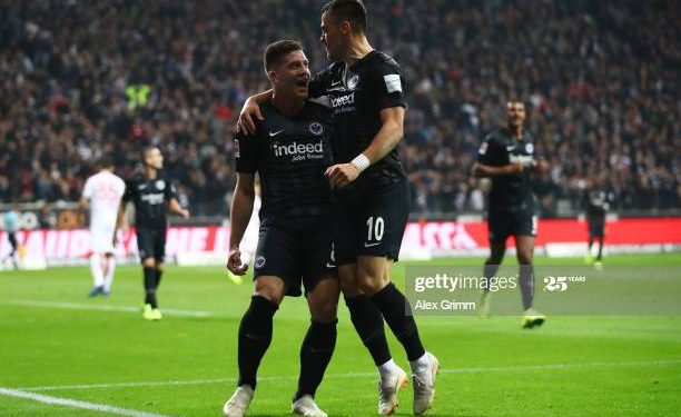FRANKFURT AM MAIN, GERMANY - OCTOBER 19:  Luka Jovic of Eintracht Frankfurt celebrates after scoring his team's second goal with Filip Kostic of Eintracht Frankfurt (10) during the Bundesliga match between Eintracht Frankfurt and Fortuna Duesseldorf at Commerzbank-Arena on October 19, 2018 in Frankfurt am Main, Germany.  (Photo by Alex Grimm/Bongarts/Getty Images)