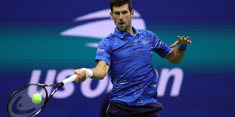 NEW YORK, NEW YORK - SEPTEMBER 01: Novak Djokovic of Serbia returns a shot during his Men's Singles fourth round match against Stan Wawrinka of Switzerland on day seven of the 2019 US Open at the USTA Billie Jean King National Tennis Center on September 01, 2019 in Queens borough of New York City. (Photo by Matthew Stockman/Getty Images)