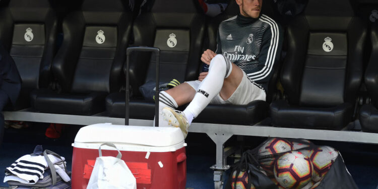 MADRID, SPAIN - MAY 19:  Gareth Bale of Real Madrid looks on from the substitute bench before the La Liga match between Real Madrid CF and Real Betis Balompie at Estadio Santiago Bernabeu on May 19, 2019 in Madrid, Spain. (Photo by Denis Doyle/Getty Images)