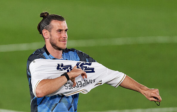 MADRID, SPAIN - JULY 16: Real Madrid CF player Gareth Bale celebrate cliching their 34th Spanish La Liga title after the La Liga match between Real Madrid CF and Villarreal CF at Estadio Alfredo Di Stefano on July 16, 2020 in Madrid, Spain. (Photo by Diego Souto/Quality Sport Images/Getty Images)
