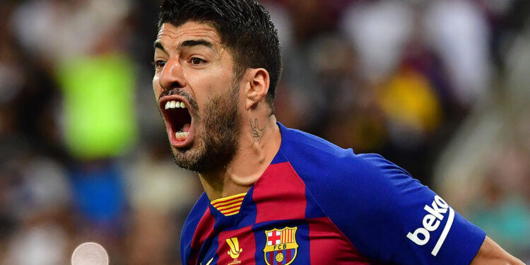 Barcelona's Uruguayan forward Luis Suarez reacts during the Spanish Super Cup semi final between Barcelona and Atletico Madrid on January 9, 2020, at the King Abdullah Sport City in the Saudi Arabian port city of Jeddah. - The winner will face Real Madrid in the final on January 12. (Photo by Giuseppe CACACE / AFP) (Photo by GIUSEPPE CACACE/AFP via Getty Images)