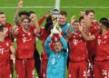 Soccer Football - DFL-Supercup - Bayern Munich v Borussia Dortmund - Allianz Arena, Munich, Germany - September 30, 2020  Bayern Munich's Manuel Neuer and teammates celebrate with the trophy after winning the Supercup   REUTERS/Andreas Gebert/Pool  DFL regulations prohibit any use of photographs as image sequences and/or quasi-video