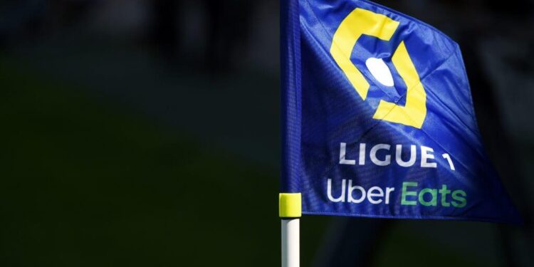 A flag of the French football division Ligue 1 with an Uber Eats logo is pictured prior to the French L1 football match between Nimes Olympique and Stade Brestois 29 on August 23, 2020, at the Costieres Stadium in Nimes, southern France. (Photo by Sylvain THOMAS / AFP) (Photo by SYLVAIN THOMAS/AFP via Getty Images)