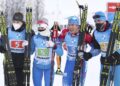Russia's team stand together after winning the mixed relay race at the Biathlon World Cup in Oberhof, Germany, Sunday, Jan. 10, 2021. (AP Photo/Matthias Schrader)