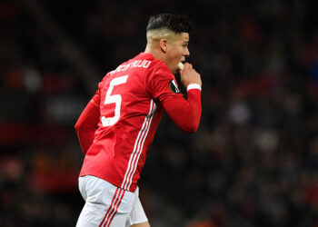 MANCHESTER, ENGLAND - MARCH 16:  Marcos Rojo of Manchester United eats a banana during the UEFA Europa League Round of 16, second leg match between Manchester United and FK Rostov at Old Trafford on March 16, 2017 in Manchester, United Kingdom.  (Photo by Stu Forster/Getty Images)