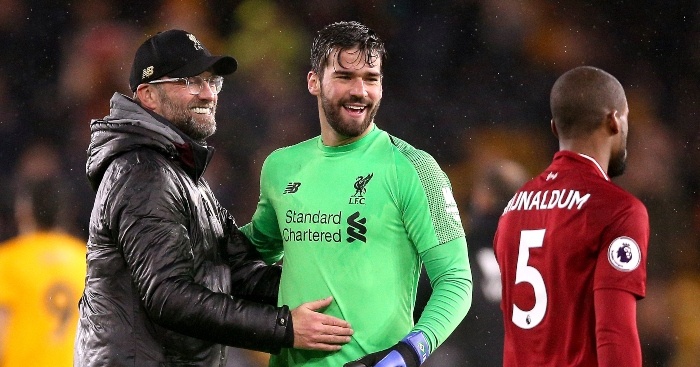 Liverpool manager Jurgen Klopp (left) goalkeeper Alisson Becker and Georginio Wijnaldum celebrate after the final whistle