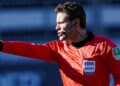 13 February 2021, Baden-Wuerttemberg, Sandhausen: Football: 2. Bundesliga, SV Sandhausen - Karlsruher SC, Matchday 21, Hardtwaldstadion. Referee Felix Brych gestures. Photo: Uwe Anspach/dpa - IMPORTANT NOTE: In accordance with the regulations of the DFL Deutsche Fußball Liga and/or the DFB Deutscher Fußball-Bund, it is prohibited to use or have used photographs taken in the stadium and/or of the match in the form of sequence pictures and/or video-like photo series.