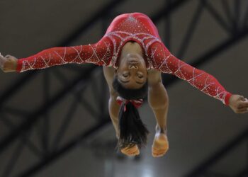 Gold medalist Simone Biles of the U.S. performs on the floor on the second and last day of the apparatus finals of the Gymnastics World Championships at the Aspire Dome in Doha, Qatar, Saturday, Nov. 3, 2018. (AP Photo/Vadim Ghirda)