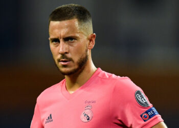 Real Madrid's Belgian forward Eden Hazard reacts during the UEFA Champions League round of 16 second leg football match between Manchester City and Real Madrid at the Etihad Stadium in Manchester, north west England on August 7, 2020. (Photo by PETER POWELL / POOL / AFP) (Photo by PETER POWELL/POOL/AFP via Getty Images)