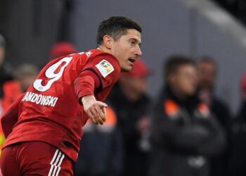 Soccer Football - Bundesliga - Bayern Munich v VfB Stuttgart - Allianz Arena, Munich, Germany - January 27, 2019  Bayern Munich's Robert Lewandowski celebrates scoring their fourth goal    REUTERS/Andreas Gebert  DFL regulations prohibit any use of photographs as image sequences and/or quasi-video