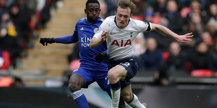 Leicester City's Nigerian midfielder Wilfred Ndidi (L) vies with Tottenham Hotspur's English midfielder Oliver Skipp during the English Premier League football match between Tottenham Hotspur and Leicester City at Wembley Stadium in London, on February 10, 2019. (Photo by Daniel LEAL-OLIVAS / AFP) / RESTRICTED TO EDITORIAL USE. No use with unauthorized audio, video, data, fixture lists, club/league logos or 'live' services. Online in-match use limited to 120 images. An additional 40 images may be used in extra time. No video emulation. Social media in-match use limited to 120 images. An additional 40 images may be used in extra time. No use in betting publications, games or single club/league/player publications. /         (Photo credit should read DANIEL LEAL-OLIVAS/AFP/Getty Images)