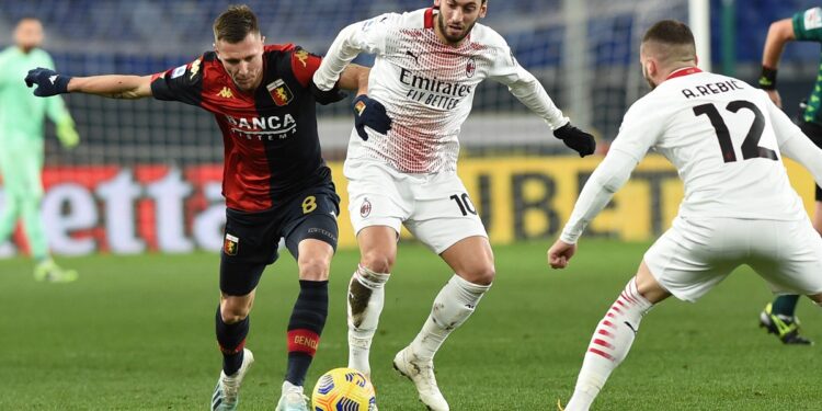 December 16, 2020, Genova, Italy: Genova, Italy, Luigi Ferraris stadium, December 16, 2020, Luca Lerager Genoa, Hakan Calhanoglu Milan, Ante Rebic Milan during Genoa CFC vs AC Milan - Italian football Serie A match Italian football Serie A match - Genoa CFC vs AC Milan, Genova, Italy PUBLICATIONxINxGERxSUIxAUTxONLY - ZUMAl164 20201216_zsa_l164_112 Copyright: xDaniloxVigox