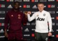 Eric Bailly of Manchester United poses with Ole Gunnar Solskjaer after signing a contract extension at Aon Training Complex on 26 April 2021. Photographer: Ash Donelon