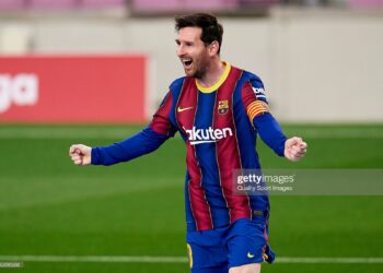 BARCELONA, SPAIN - APRIL 29: Lionel Messi of FC Barcelona celebrates his team's first goal during the La Liga Santander match between FC Barcelona and Granada CF at Camp Nou on April 29, 2021 in Barcelona, Spain. Sporting stadiums around Spain remain under strict restrictions due to the Coronavirus Pandemic as Government social distancing laws prohibit fans inside venues resulting in games being played behind closed doors. (Photo by Pedro Salado/Quality Sport Images/Getty Images)