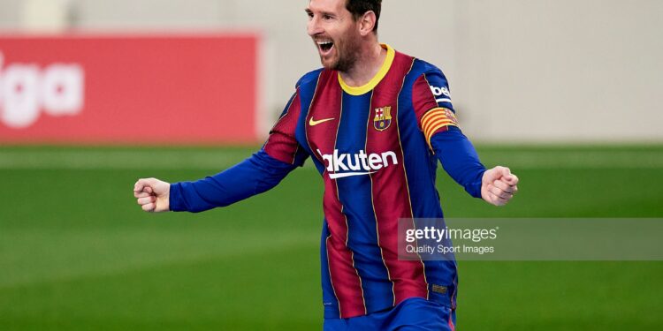BARCELONA, SPAIN - APRIL 29: Lionel Messi of FC Barcelona celebrates his team's first goal during the La Liga Santander match between FC Barcelona and Granada CF at Camp Nou on April 29, 2021 in Barcelona, Spain. Sporting stadiums around Spain remain under strict restrictions due to the Coronavirus Pandemic as Government social distancing laws prohibit fans inside venues resulting in games being played behind closed doors. (Photo by Pedro Salado/Quality Sport Images/Getty Images)