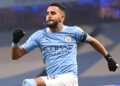 MANCHESTER, ENGLAND - NOVEMBER 28: Riyad Mahrez of Manchester City celebrates after scoring his team's first goal during the Premier League match between Manchester City and Burnley at Etihad Stadium on November 28, 2020 in Manchester, England. Sporting stadiums around the UK remain under strict restrictions due to the Coronavirus Pandemic as Government social distancing laws prohibit fans inside venues resulting in games being played behind closed doors. (Photo by Laurence Griffiths/Getty Images)