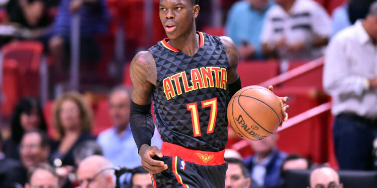 Feb 1, 2017; Miami, FL, USA; Atlanta Hawks guard Dennis Schroder (17) dribbles the ball up court against the Miami Heat during the first half at American Airlines Arena. Miami Heat won 116-93. Mandatory Credit: Steve Mitchell-USA TODAY Sports