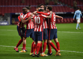 MADRID, SPAIN - FEBRUARY 08: Atletico de Madrid players celebrate after they scored their second goal during the La Liga Santander match between Atletico de Madrid and RC Celta at Estadio Wanda Metropolitano on February 08, 2021 in Madrid, Spain. Sporting stadiums around Spain remain under strict restrictions due to the Coronavirus Pandemic as Government social distancing laws prohibit fans inside venues resulting in games being played behind closed doors. (Photo by Denis Doyle/Getty Images)