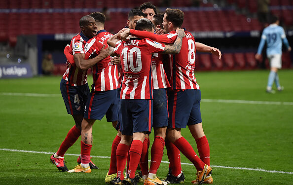 MADRID, SPAIN - FEBRUARY 08: Atletico de Madrid players celebrate after they scored their second goal during the La Liga Santander match between Atletico de Madrid and RC Celta at Estadio Wanda Metropolitano on February 08, 2021 in Madrid, Spain. Sporting stadiums around Spain remain under strict restrictions due to the Coronavirus Pandemic as Government social distancing laws prohibit fans inside venues resulting in games being played behind closed doors. (Photo by Denis Doyle/Getty Images)
