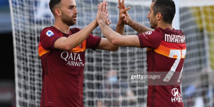 ROME, ITALY - MAY 09: Borja Mayoral of AS Roma celebrates with teammate Henrikh Mkhitaryan after scoring goal 1-0 during the Serie A match between AS Roma  and FC Crotone at Stadio Olimpico on May 09, 2021 in Rome, Italy. Sporting stadiums around Italy remain under strict restrictions due to the Coronavirus Pandemic as Government social distancing laws prohibit fans inside venues resulting in games being played behind closed doors. (Photo by Silvia Lore/Getty Images)