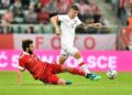 epa09241935 Poland's Dawid Kownacki (R) and Russia's Georgi Dzhikiya (L) in action during the international friendly soccer match between Poland and Russia in Wroclaw, western Poland, 01 June 2021.  EPA-EFE/Maciej Kulczynski POLAND OUT