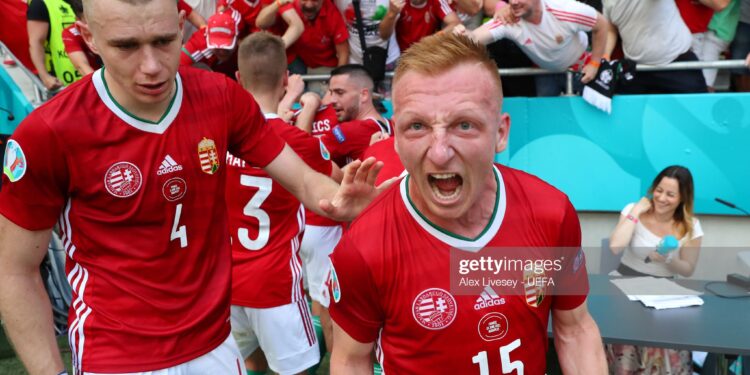 BUDAPEST, HUNGARY - JUNE 19: Laszlo Kleinheisler of Hungary celebrates their side's first goal scored by team mate Attila Fiola (not pictured) during the UEFA Euro 2020 Championship Group F match between Hungary and France at Puskas Arena on June 19, 2021 in Budapest, Hungary. (Photo by Alex Livesey - UEFA/UEFA via Getty Images)
