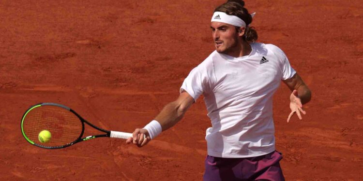 PARIS, FRANCE - JUNE 02: Stefanos Tsitsipas of Greece plays a forehand during his mens second round match against Mario Vilella Martinez of Spain during day four of the 2021 French Open at Roland Garros  on June 02, 2021 in Paris, France. (Photo by Adam Pretty/Getty Images)