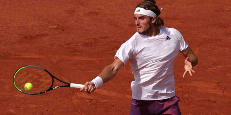 PARIS, FRANCE - JUNE 02: Stefanos Tsitsipas of Greece plays a forehand during his mens second round match against Mario Vilella Martinez of Spain during day four of the 2021 French Open at Roland Garros  on June 02, 2021 in Paris, France. (Photo by Adam Pretty/Getty Images)