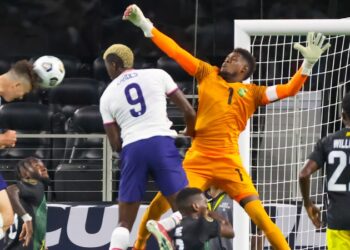 Jul 25, 2021; Arlington, Texas, USA; United States forward Matthew Hoppe (13) scores a goal past Jamaica goalkeeper Andre Blake (1) during the second half of a CONCACAF Gold Cup quarterfinal soccer match at AT&T Stadium. Mandatory Credit: Kevin Jairaj-USA TODAY Sports