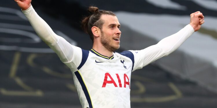 LONDON, ENGLAND - APRIL 21: Gareth Bale of Tottenham Hotspur celebrates after scoring their side's first goal during the Premier League match between Tottenham Hotspur and Southampton at Tottenham Hotspur Stadium on April 21, 2021 in London, England. Sporting stadiums around the UK remain under strict restrictions due to the Coronavirus Pandemic as Government social distancing laws prohibit fans inside venues resulting in games being played behind closed doors. (Photo by Clive Rose/Getty Images)