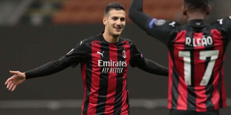 MILAN, ITALY - OCTOBER 29:  Diogo Dalot of AC Milan celebrates his goal with his team-mate Rafael Leao during the UEFA Europa League Group H stage match between AC Milan and AC Sparta Praha at San Siro Stadium on October 29, 2020 in Milan, Italy. (Photo by Emilio Andreoli/Getty Images)