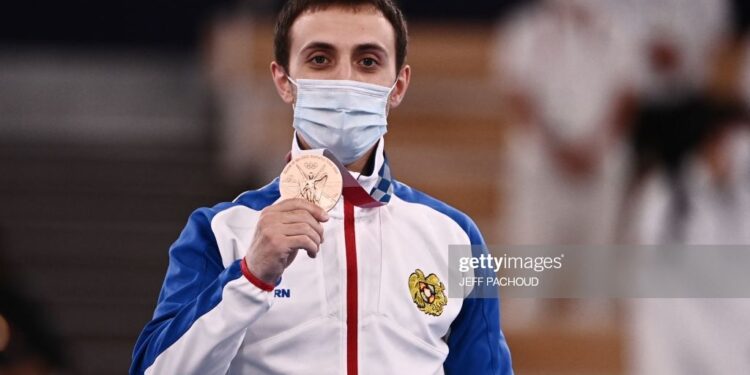 Bronze medallist Armenia's Artur Davtyan poses during the podium ceremony of the artistic gymnastics men's vault of the Tokyo 2020 Olympic Games at the Ariake Gymnastics Centre in Tokyo on ugust 2, 2021. (Photo by Jeff PACHOUD / AFP) (Photo by JEFF PACHOUD/AFP via Getty Images)