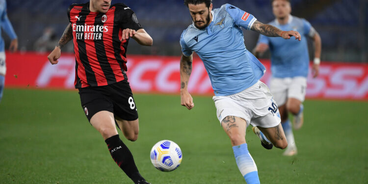 Sandro Tonali of AC Milan and Luis Alberto of SS Lazio compete for the ball during the Serie A football match between SS Lazio and AC Milan at Olimpico Stadium in Roma Italy, April 26h, 2021. Photo Antonietta Baldassarre / Insidefoto antoxbaldassarre