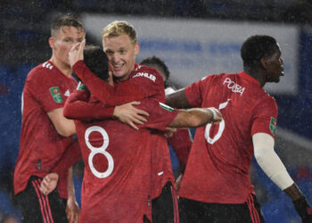 Manchester United's Spanish midfielder Juan Mata celebrates with teammates after he  scores his team's second goal during the English League Cup fourth round football match between Brighton and Hove Albion and Manchester United at the American Express Community Stadium in Brighton, southern England on September 30, 2020. (Photo by Andy Rain / POOL / AFP) / RESTRICTED TO EDITORIAL USE. No use with unauthorized audio, video, data, fixture lists, club/league logos or 'live' services. Online in-match use limited to 120 images. An additional 40 images may be used in extra time. No video emulation. Social media in-match use limited to 120 images. An additional 40 images may be used in extra time. No use in betting publications, games or single club/league/player publications. /  (Photo by ANDY RAIN/POOL/AFP via Getty Images)