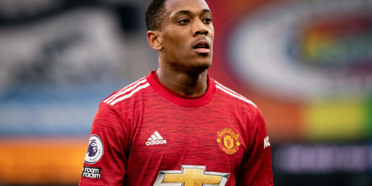 MANCHESTER, ENGLAND - MARCH 07:   Anthony Martial of Manchester United in action during the Premier League match between Manchester City and Manchester United at Etihad Stadium on March 7, 2021 in Manchester, United Kingdom. Sporting stadiums around the UK remain under strict restrictions due to the Coronavirus Pandemic as Government social distancing laws prohibit fans inside venues resulting in games being played behind closed doors. (Photo by Ash Donelon/Manchester United via Getty Images)