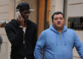MILAN, ITALY - MARCH 05:  Mino Raiola (R) and Mario Balotelli are seen on March 5, 2013 in Milan, Italy.  (Photo by Jacopo Raule/Getty Images)