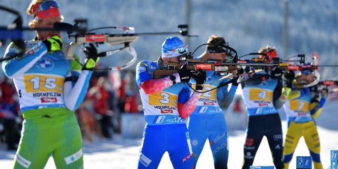 (L-R) Slovenia's Klemen Bauer, Russia's Alexander Loginov, France's Emilien Jacquelin, Germany's Roman Rees and Sweden's Malte Stefansson compete at the shooting range during the men's 4x7,5 km relay event of the IBU Biathlon World Cup in Hochfilzen, Austria, on December 12, 2021. (Photo by JOE KLAMAR / AFP)