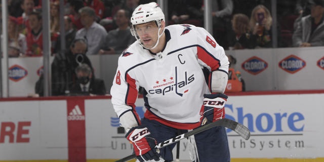 CHICAGO, ILLINOIS - DECEMBER 15: Alex Ovechkin #8 of the Washington Capitals reacts after scoring against the Chicago Blackhawks in the second period at United Center on December 15, 2021 in Chicago, Illinois. (Photo by Bill Smith/NHLI via Getty Images)