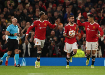 MANCHESTER, ENGLAND - OCTOBER 20: Marcus Rashford of Manchester United celebrates after scoring a goal to make it 1-2 during the UEFA Champions League group F match between Manchester United and Atalanta at Old Trafford on October 20, 2021 in Manchester, United Kingdom. (Photo by Matthew Ashton - AMA/Getty Images)