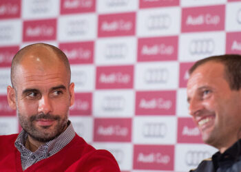 MUNICH, GERMANY - JULY 30:   Trainer Pep Guardiola (left), head coach of FC Bayern Munich and Massimiliano Allegri  head coach of AC Milan smile during the Audi Cup 2013 Press Conference at the Westin Grand Hotel on July 30, 2013 in Munich, Germany. (Photo by Sebastian Widmann/Bongarts/Getty Images)