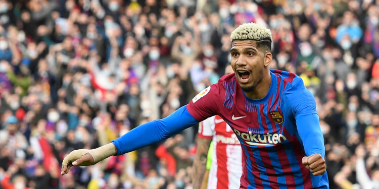 Barcelona's Uruguayan defender Ronald Araujo celebrates scoring his team's third goal during the Spanish league football match between FC Barcelona and Club Atletico de Madrid at the Camp Nou stadium in Barcelona on February 6, 2022. (Photo by Josep LAGO / AFP) (Photo by JOSEP LAGO/AFP via Getty Images)