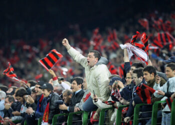 Milan, ITALY: AC Milan supporters celebrate defeating Manchester United in the Champions League second leg semi-final football match at Milan's San Siro Stadium, 02 May 2007. AC Milan won the match 3-0 qualifying for the final in Athens against Liverpool  23 May.  AFP PHOTO / FILIPPO MONTEFORTE (Photo credit should read FILIPPO MONTEF0RTE/AFP/Getty Images)