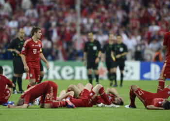 Players of Bayern Munich react after losing their Champions League final soccer match against Chelsea at the Allianz Arena in Munich, May 19, 2012.  REUTERS/Dylan Martinez (GERMANY  - Tags: SPORT SOCCER)