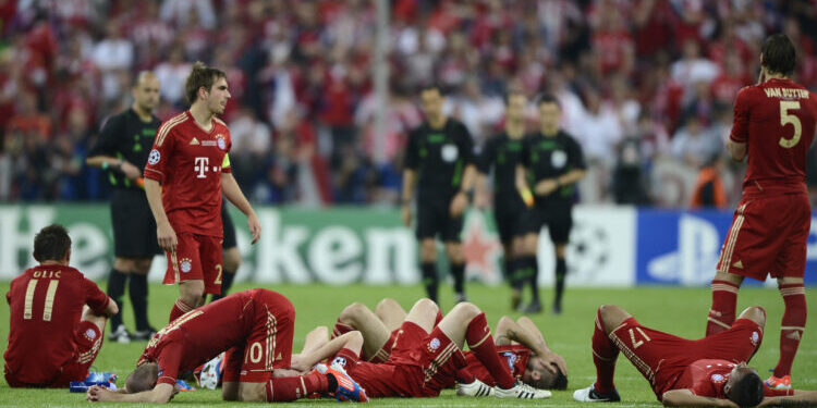 Players of Bayern Munich react after losing their Champions League final soccer match against Chelsea at the Allianz Arena in Munich, May 19, 2012.  REUTERS/Dylan Martinez (GERMANY  - Tags: SPORT SOCCER)
