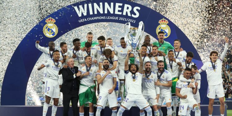 PARIS, FRANCE - MAY 28: Marcelo of Real Madrid lifts the UEFA Champions League trophy after their sides victory during the UEFA Champions League final match between Liverpool FC and Real Madrid at Stade de France on May 28, 2022 in Paris, France. (Photo by Alexander Hassenstein - UEFA/UEFA via Getty Images)